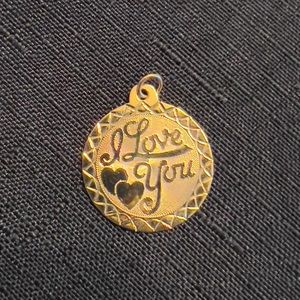 *Just sold* 14k GF “I love you” pendant. 3/4” round. 1.5 grams.